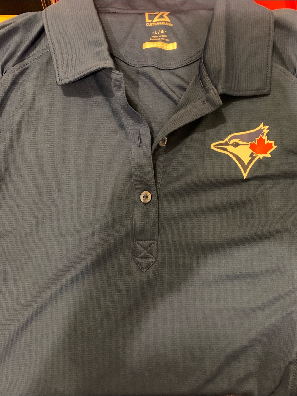 Cutter & Buck Women’s Blue Athletic Polo with Blue Jays Logo